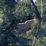 Concrete dam to hold back soil erosion.