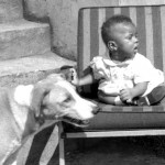 Roy Benjamin's daughter, Catherine Ann, with the family's pet dog.